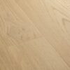 lvt-parkett-quick-step-blos-coast-tamm-beige LVT parkett Quick-Step Blos Coast tamm beige heleda tooni ja kergelt oksliku tammest põrandalad disainiga